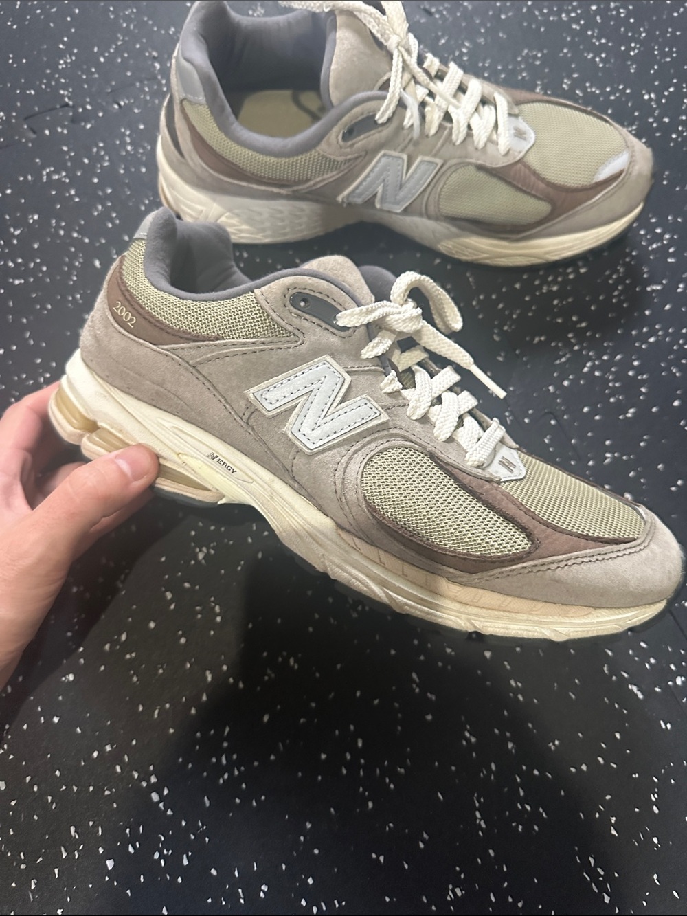 New Balance men's sneakers in olive green and tan brown